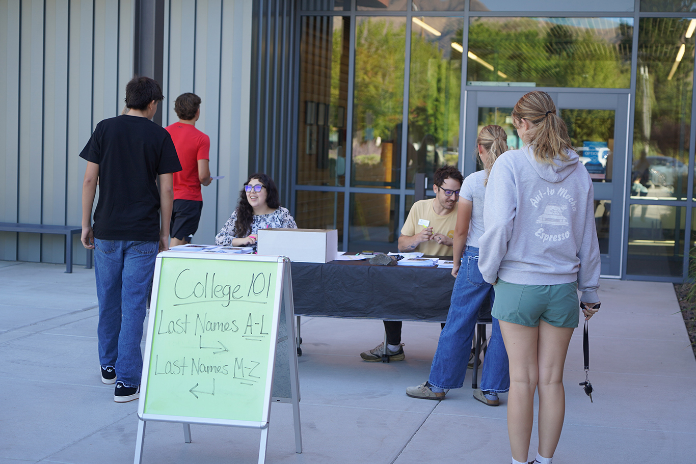Running Start team helping students