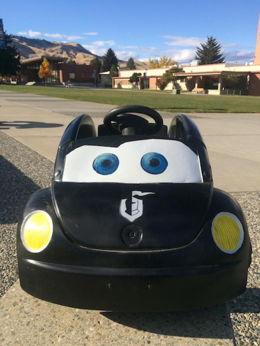 Knight Bug, a small black child's car with a Knights logo on the hood