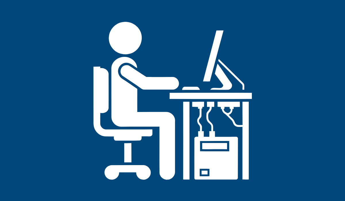 A white icon of a person seated at a computer desk against a blue background.